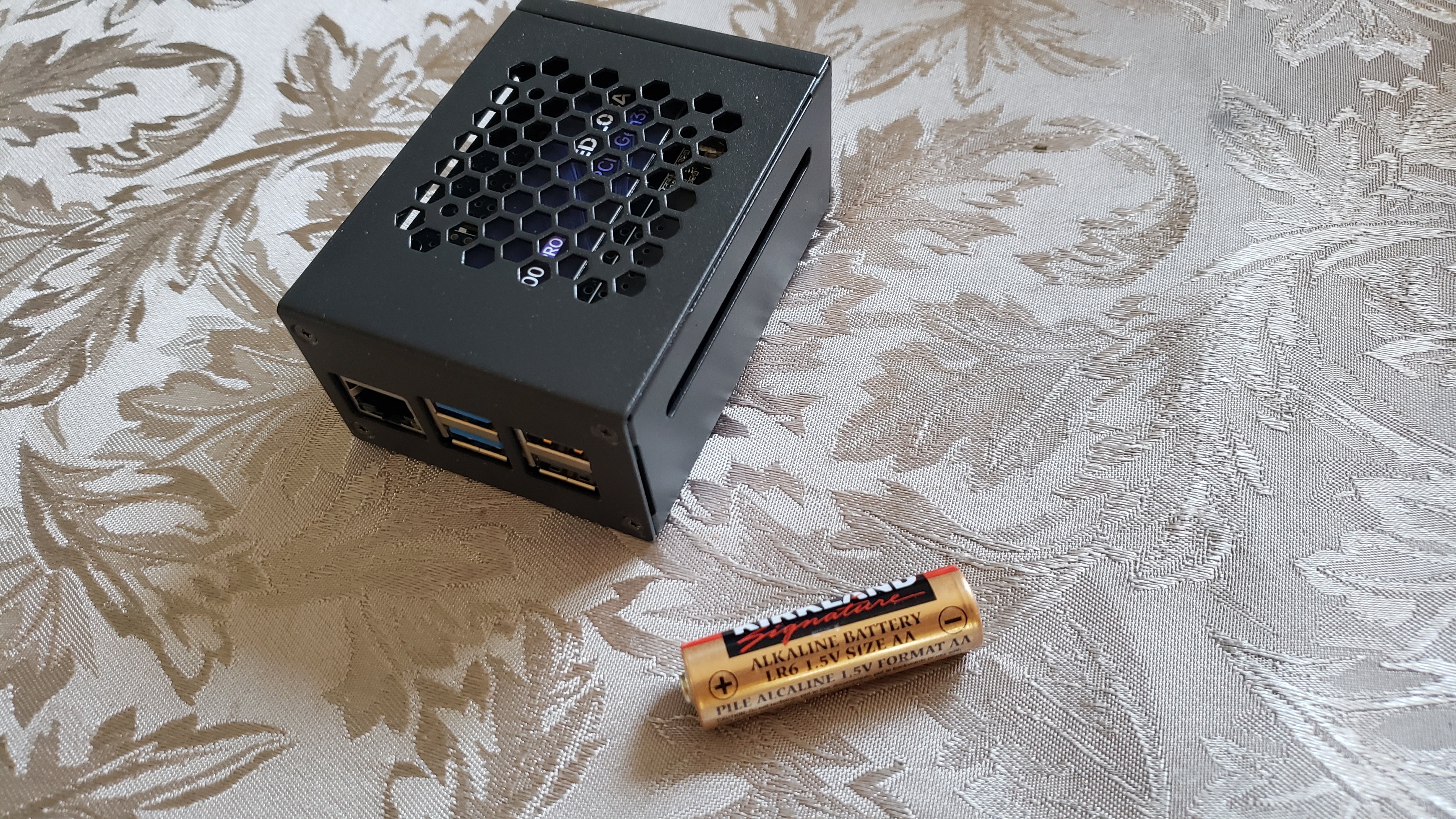 NAC Translate Pro, AA battery is for scale